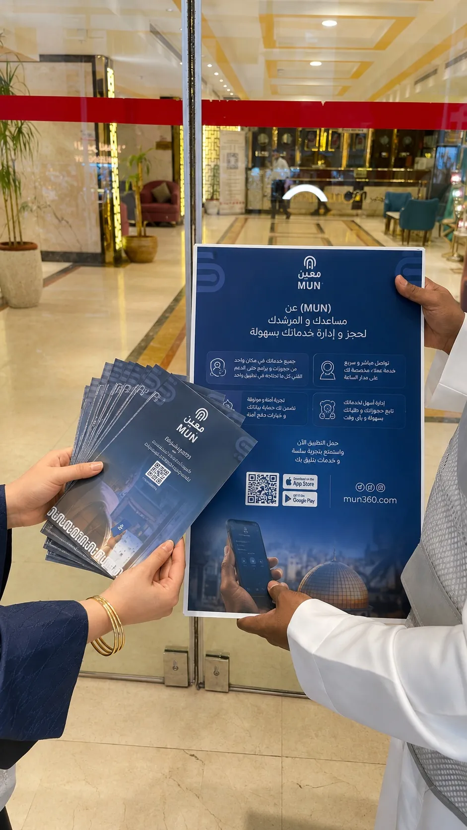 Moeen representative explaining printed orientation material