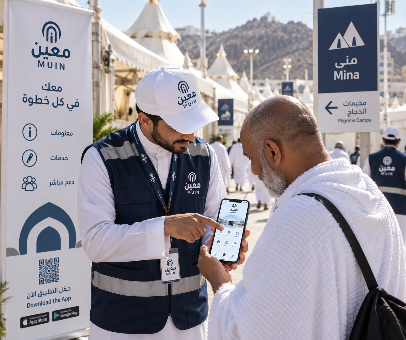 Moeen team member helping a pilgrim through a digital service